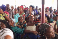 PARTICIPANTS WAIT IN LINE TO GET FREE CLOTHES