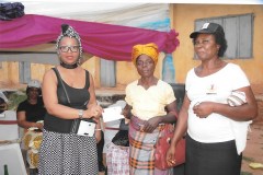 Another-beneficiary-recieveing-her-cheque-.jpeg